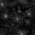 Seamless pattern of white Halloween spider webs on black background. Royalty Free Stock Photo