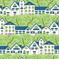 Seamless pattern of white houses and green trees.