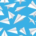 Seamless pattern. White paper planes. Flat airplanes. Vector illustration on blue background