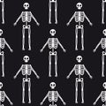 Seamless pattern with white skeletons