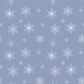 Seamless pattern with white snowflakes on a gray-blue background Royalty Free Stock Photo