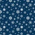 Seamless pattern, white snowflakes and stars on a blue background. Print, christmas background, textile vector Royalty Free Stock Photo