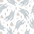 Seamless pattern with winter rabbit, hare and hand drawn elements