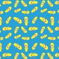 Seamless pattern yellow-blue flip flops with a fish pattern for everyday walks, for the pool, for going to the beach Royalty Free Stock Photo