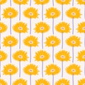 Seamless pattern with yellow gerbera flowers on a beige background