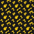 Seamless pattern yellow power tools on dark background Royalty Free Stock Photo