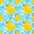 Seamless pattern with yellow rubber ducks