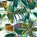 Seamless pattern with yellow snakes and bright tropical plants: ficus, palm leaves.