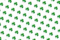 Seamless photo pattern Shamrock made of green glass hearts on white background Royalty Free Stock Photo