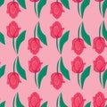 Seamless pink background with red tulips.