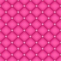 Seamless pink quilted background with pins.