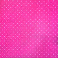 Seamless pink and white polka fabric