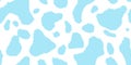 Seamless playful light pastel blue and white cow or calico cat spots fabric pattern