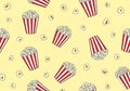 Seamless Popcorn Bucket Pattern on Yellow Background Royalty Free Stock Photo