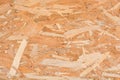 Seamless pressed wooden panel or strand board OSB background