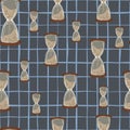 Seamless random pattern with beige hourglass ornament. Dark grey chequered background