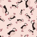 Seamless random pattern with doodle puffin bird hand drawn print. Pastel pink background. Doodle artwork