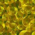 Seamless raster pattern. Golden transparent bubbles of different sizes randomly scattered on a green. Royalty Free Stock Photo