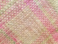 Seamless realistic old bamboo weave basket repeat pattern. Texture of golden yellow rattan mat for background and interior design Royalty Free Stock Photo