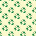 Seamless recycle sign pattern on yellow background