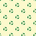 Seamless recycle sign pattern on yellow background