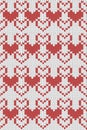 Seamless red and white knitted zigzag pattern, perfect for winter textiles Royalty Free Stock Photo