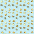 Seamless regular creative pattern with bright shiny little Christmas balls on blue paper. Royalty Free Stock Photo