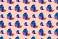 Seamless regular pattern with toy houses on a pastel background. Hard light. Minimal summer concept