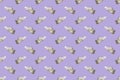 Seamless regular pattern women`s casual sneakers on a lilac background.