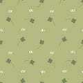 Seamless repeat pattern saint patrick`s day with four leaf clover shamrock in green background Royalty Free Stock Photo