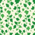 Seamless repeating pattern design featuring vibrant green ivy vines and assorted foliage elements set against a subtle pale cream Royalty Free Stock Photo