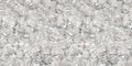 Seamless ripped and crumpled silver aluminum foil background texture.