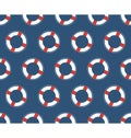 Seamless sea pattern. White lifebuoy on blue