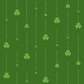 Seamless shamrock ornament with green beads of dots and clover leaves on dark green background Royalty Free Stock Photo