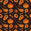 Seamless skull and bone pattern on black background in . Background of orange skeleton. Bright design for textile, paper, Royalty Free Stock Photo