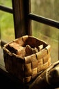 Seamless small splint baskets on window sill. Reflection in the window of handmade weaved rustic baskets