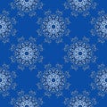 Seamless snowflakes openwork pattern. Fabulous fractal background with circle ornament. Mary Christmas and Happy New Year theme.