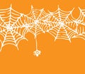 Seamless spider web border with a spider for Halloween. Vector horizontal strip of spider web texture with a white outline on Royalty Free Stock Photo