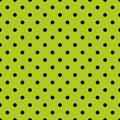 Seamless spring vector pattern or tile texture with black polka dots on fresh grass green background. Royalty Free Stock Photo