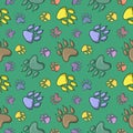 Seamless pattern , Colorful paw prints of different animals, bright print for children, cartoon style Royalty Free Stock Photo