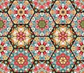 Seamless stained glass design. Vector tiled ornament. Colorful patchwork pattern from hexagonal patches