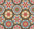 Seamless stained glass design. Vector tiled ornament. Colorful patchwork pattern from hexagonal patches