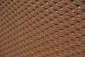 Seamless structured plastic surface in brown with a gradient from sharp foreground on the right to blurry background on the left Royalty Free Stock Photo