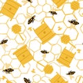 Seamless stylized pattern with doodle bee ornament. Farm print with hives, honeycombs and honey spoons silhouettes. Yellow