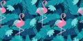 Seamless summer pattern with pink flamingo and tropical leaves and flower. Blue leaves and flamingo on a dark background Royalty Free Stock Photo