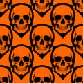 seamless symmetrical pattern of black human skulls on an orange background