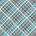 Seamless tartan plaid pattern. Checkered fabric texture print in stripes of bright blue, teal black, teal blue and white. eps10 Royalty Free Stock Photo