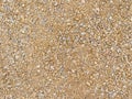 Seamless texture beige gravel. Ground surface road work