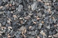 Seamless texture of close up granite breakstone gravel. Crushed stone background for design usage