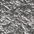 Seamless texture of crumpled aluminum foil sheet. Royalty Free Stock Photo